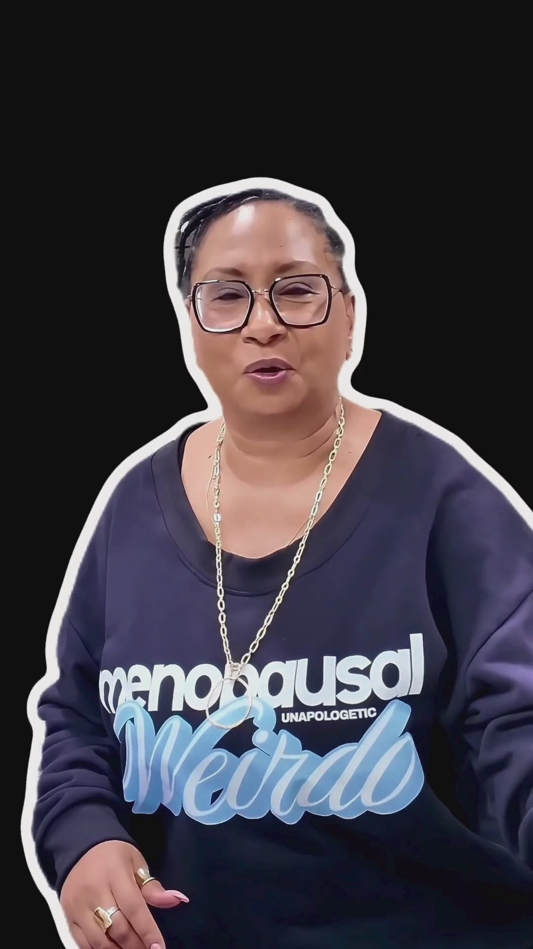 Load video: Model wearing the Full Bloom Savage Menopause Weirdo sweatshirt unbuttons the side snaps to release ventilation during a hot flash.